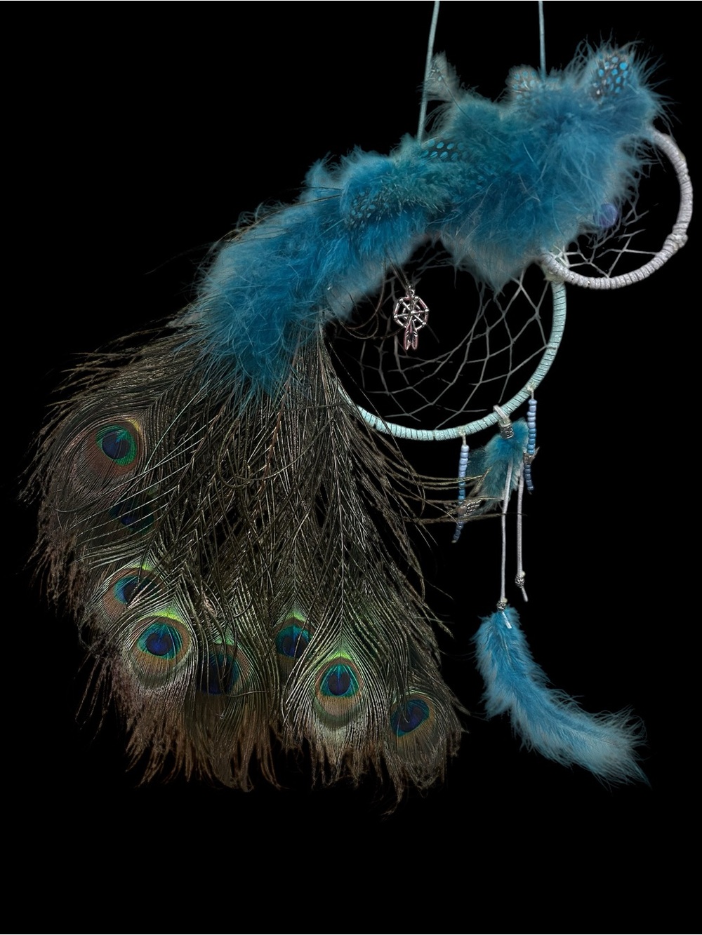 Beautiful Teal Accented Dreamcatcher with Peacock Feathers